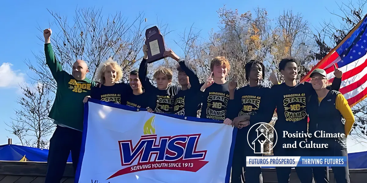 The Cross Country team at Woodbridge High School holding a banner and trophy